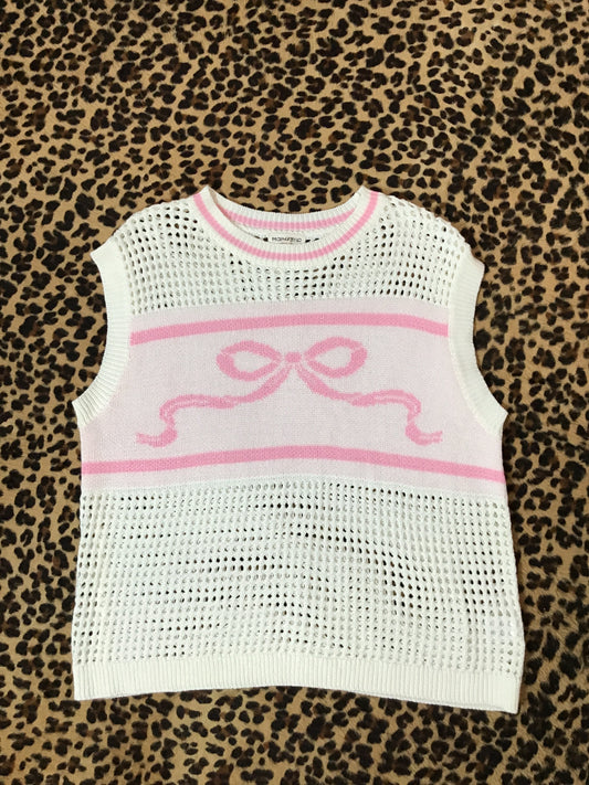 Pink and white bow vest